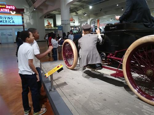 Student viewing a car